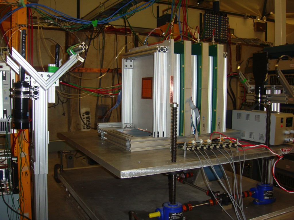 The UTA team’s four GEM chambers set up in the Fermilab Test Beam Facility. Three of these chambers are read out through 1-bit DCAL chip and one is read out through 13-bit KPiX chip. Image: Jaehoon Yu