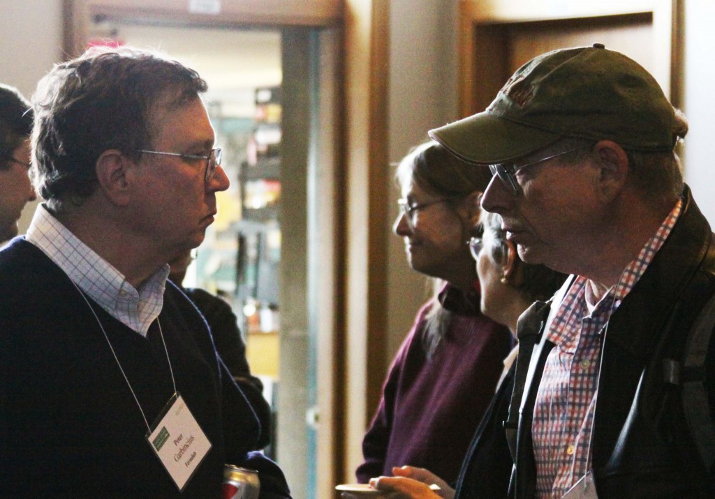 Peter Garbincius in discussion with Gerry Dugan during Baseline Assessment Workshop at SLAC