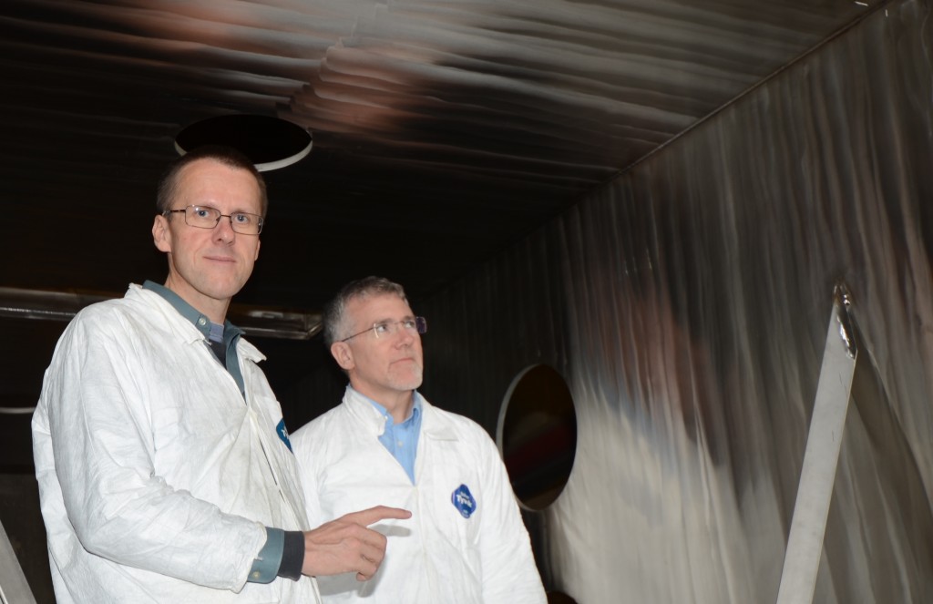 PAVAC President Ralf Edinger (left) and associate Doug LaPointe inspect a vacuum chamber the company is manufacturing for an electron beam welder. Image: Ralf Edinger